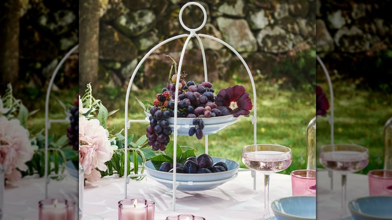 IEKA TOFSAND on a dining table outside loaded with fruit