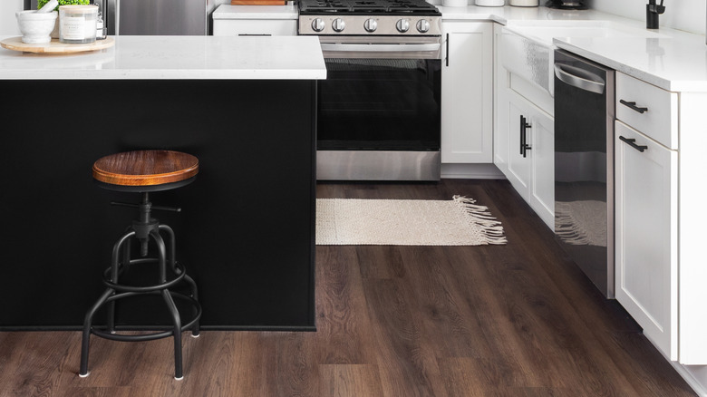 Kitchen with dark hardwood floor