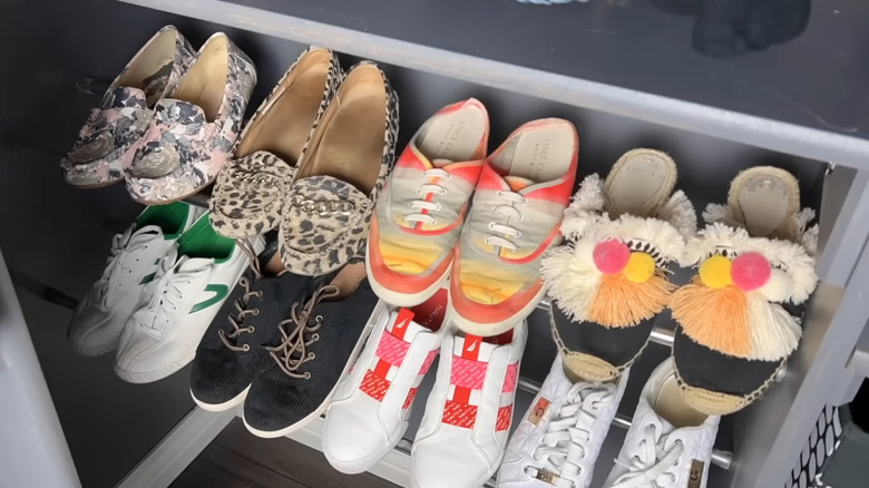 shoes sitting on metal rack