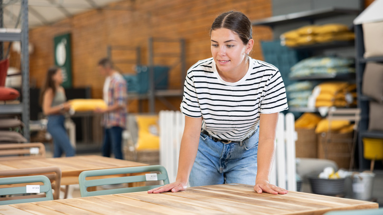 Person shopping for patio furniture