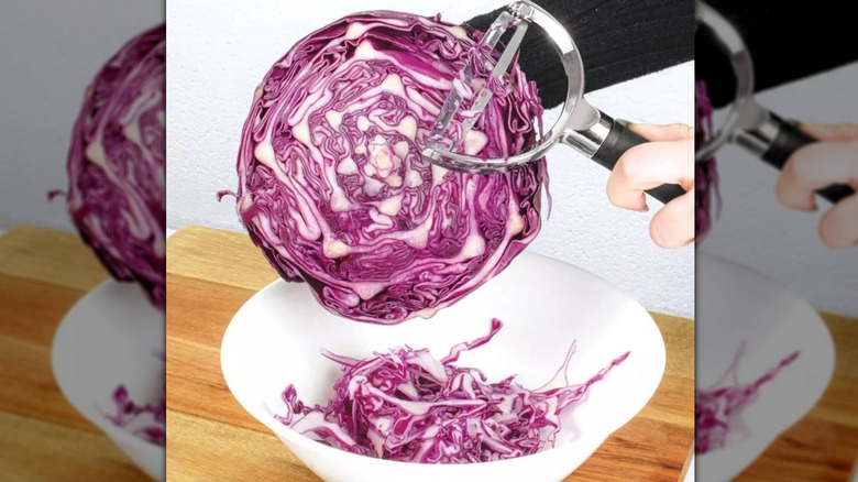 hands holding up kitchen utensils