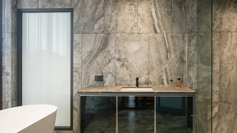 Bathroom covered in large format tile
