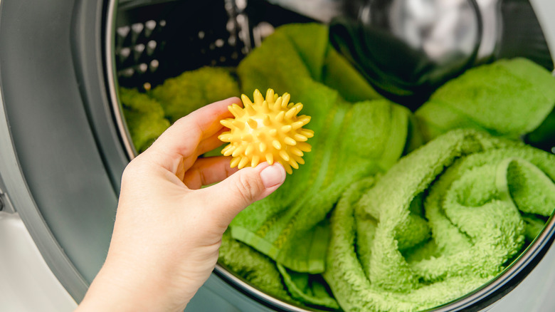 hand holding spikey dryer ball