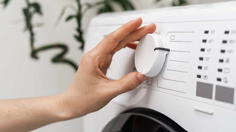 hand changing dryer setting