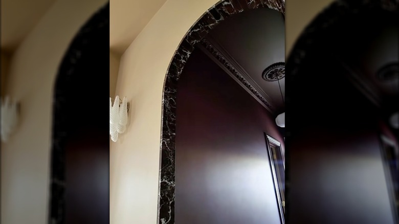 dark red marble detail as trim on archway