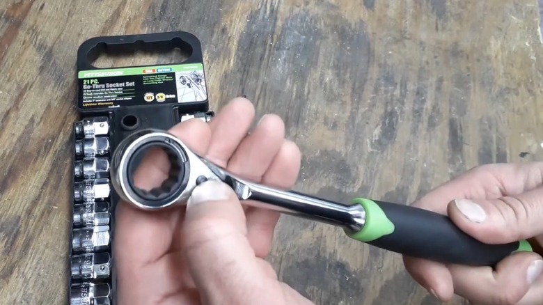 Person holding a Pittsburgh socket wrench