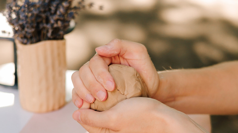 All You Need Is A Glass Vase And Clay For This Adorable Spring-Inspired Decor