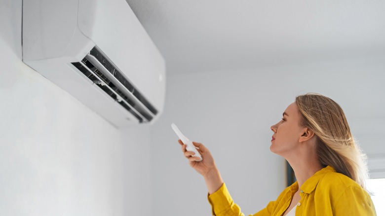 woman with split system air con