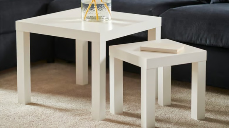 two white IKEA LACK tables
