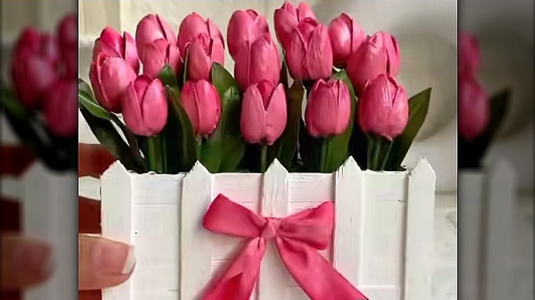 A miniature garden box of tullips