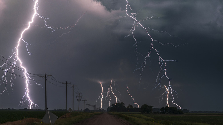 Lightning strikes near road