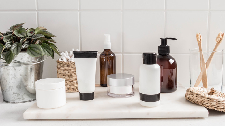 Bathroom countertop with products spread out