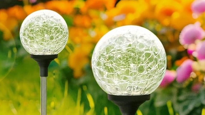Cracked glass ball lights during daytime