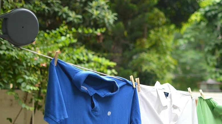 The Riveda Retractable Clothesline with clothes hanging on the line