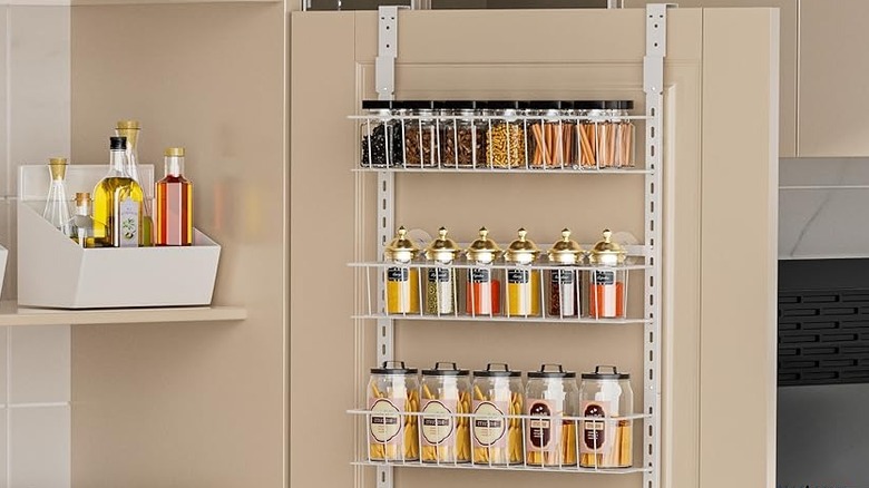 An over the door organizer holding pantry items