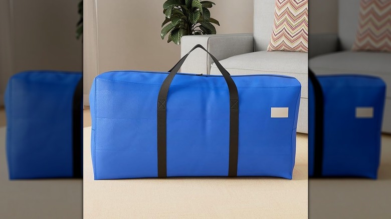 DoYiKe extra large storage duffle bag sitting on floor in living area