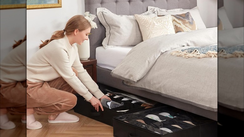 woman using Lifewit under bed shoe organizers