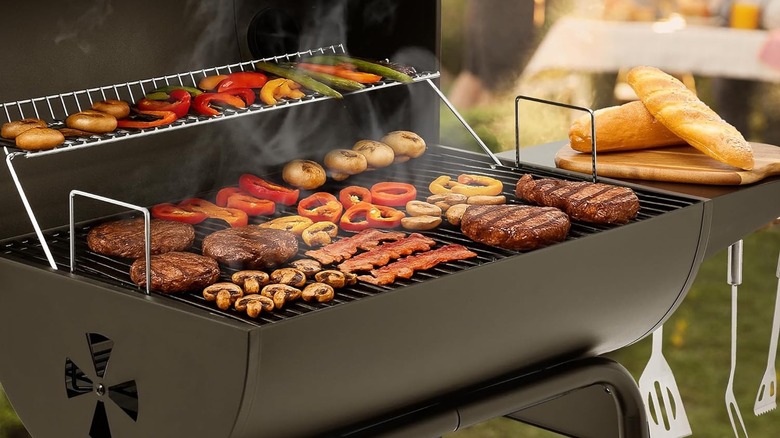 A picture of assorted food cooking on the Royal Gourmet grill