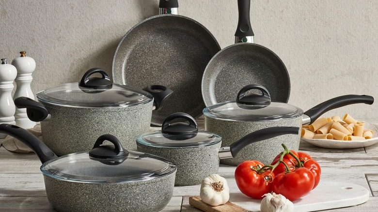 A 10-piece set of Ballerini Parma non-stick pans are arranged on a kitchen counter.