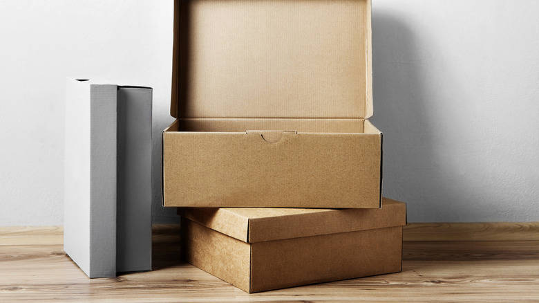 Empty cardboard boxes sitting on the floor.