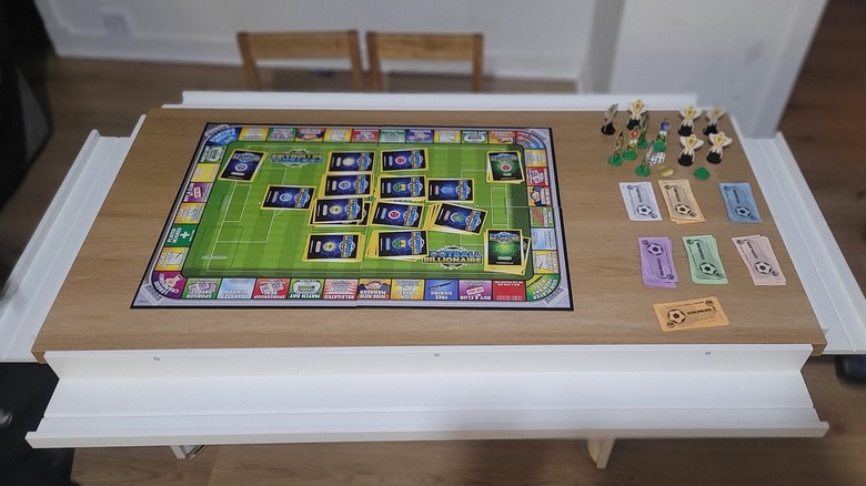 Board game table made with tabletop and picture ledge