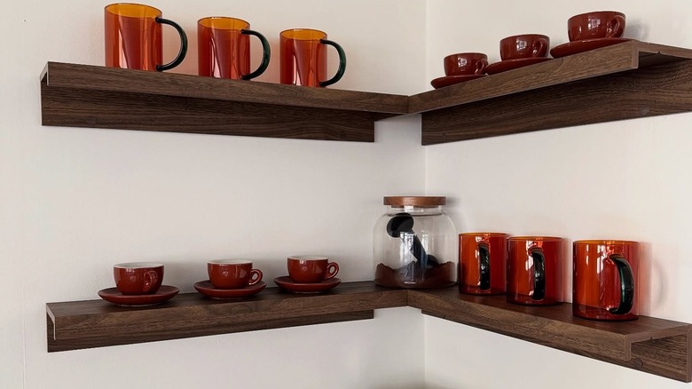 Coffee mug holders made from flipped over picture ledge shelves