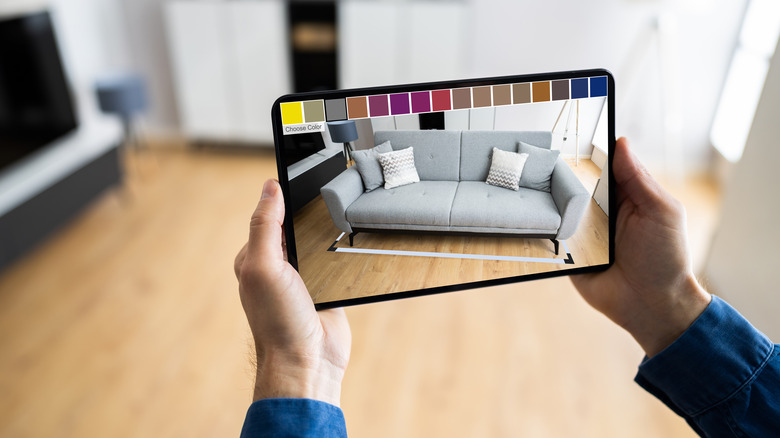 Person using tablet color-design app