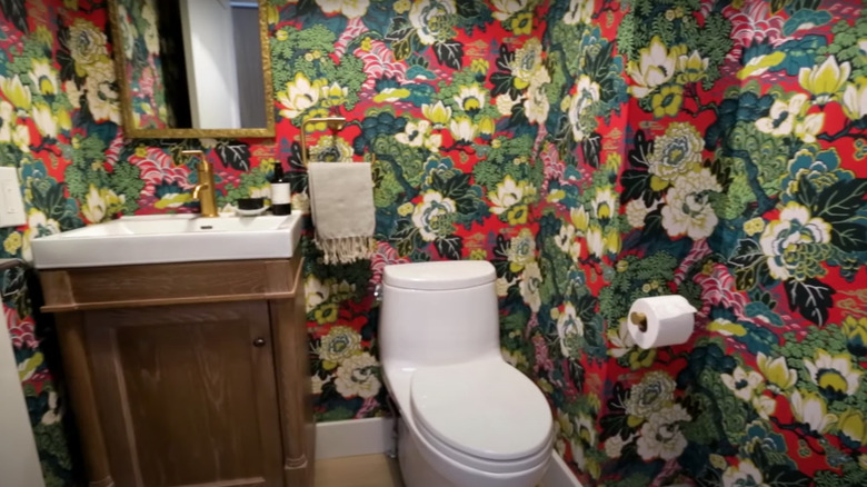 Bathroom with floral wallpaper