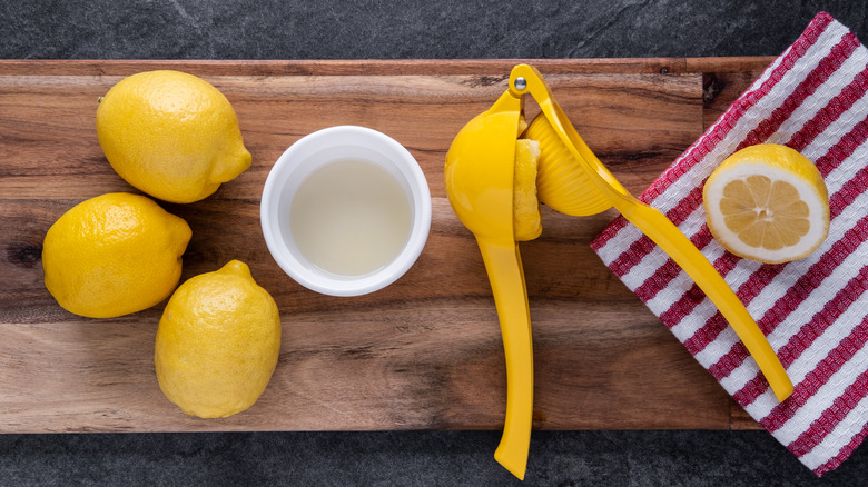 lemons on cutting board