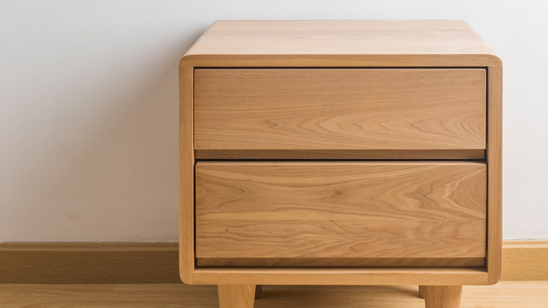 Closeup of a pine table with two drawers