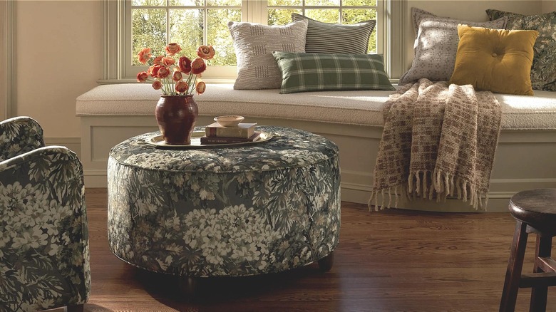 Upholstered ottoman in a living room