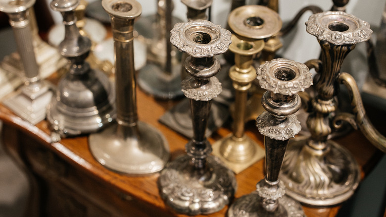 Silver candlestick holders for sale secondhand.