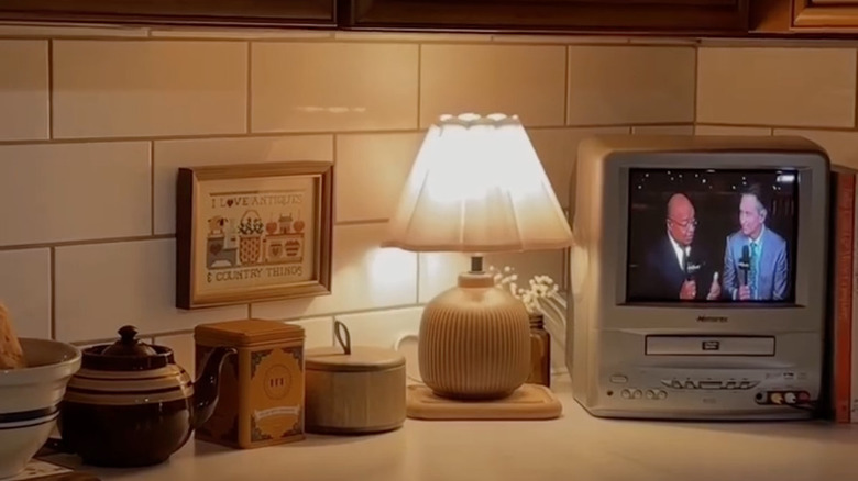 A vintage tv on kitchen counter