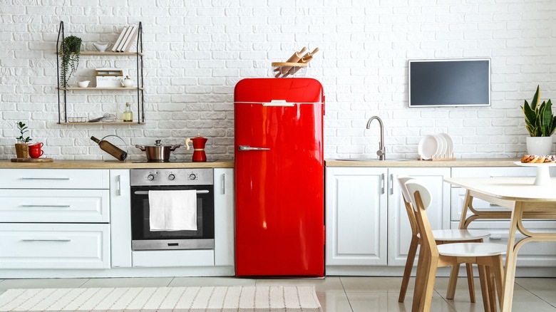 Red fridge in kitchen 