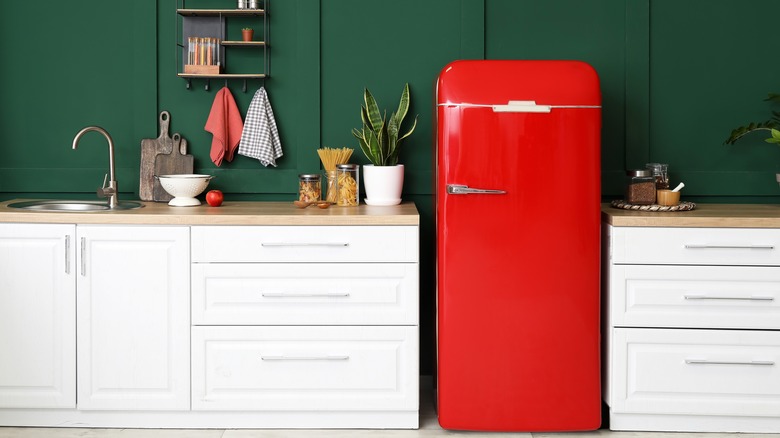 Kitchen with red refrigerator