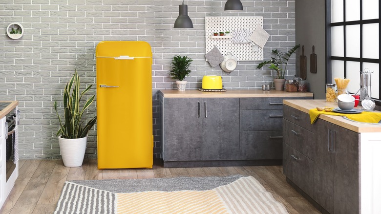 Kitchen with yellow fridge