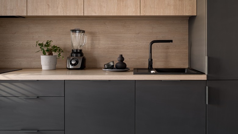 Dark accented kitchen area