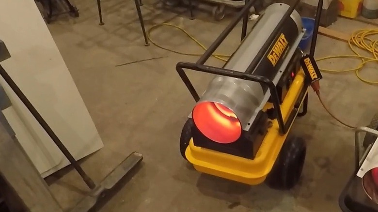 DeWalt kerosene heater operating in a workshop