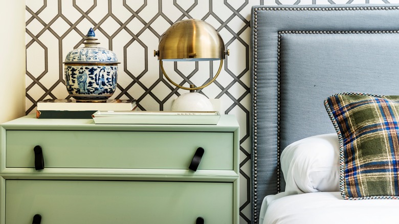 Green dresser in bedroom