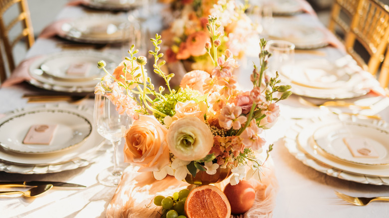 Elegant table setting with floral arrangements