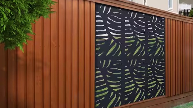 Modinex fence panels enclosing a backyard
