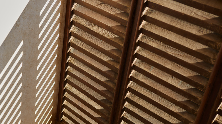 Interior wooden shutters in brown