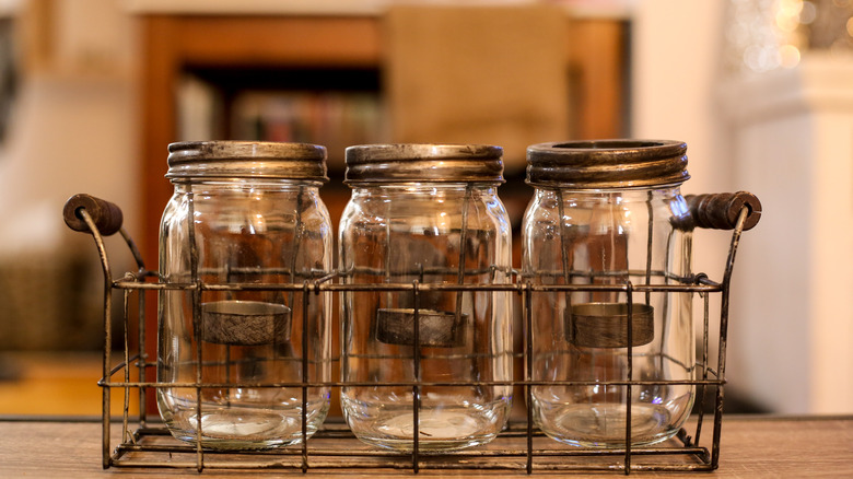 mason jars in metal basket