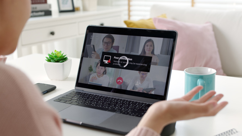 Woman on a video call experiencing network issues