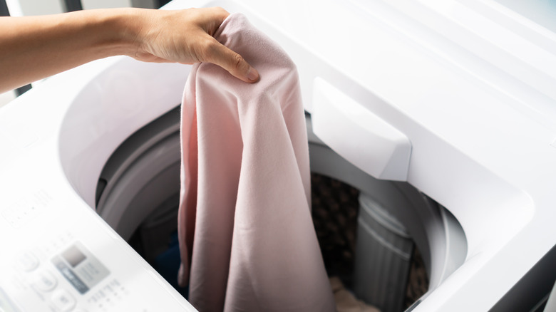 Clothes going in washing machine