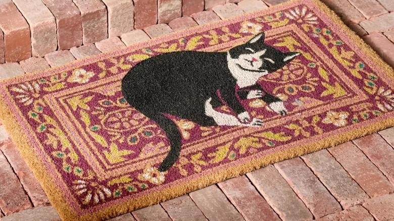 A colorful doormat with a cat print from Anthropologie