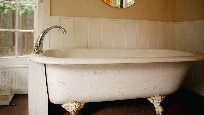 Close up image soaking tub with silver fixture
