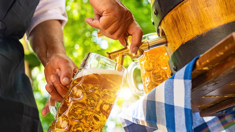 beer being poured from keg