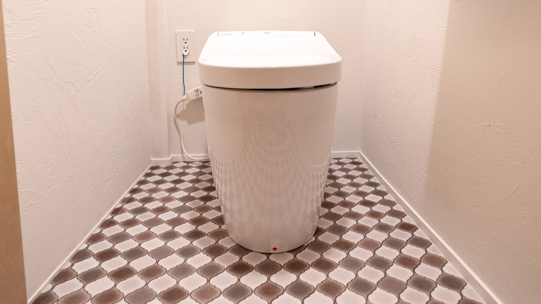 Modern tankless toilet in a bathroom