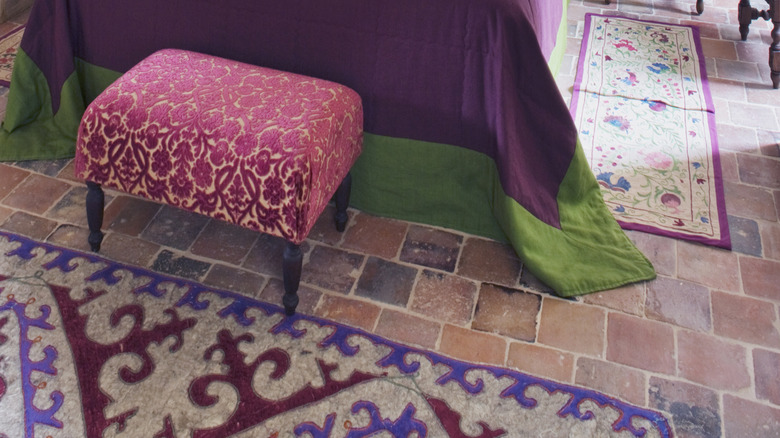 Outdated bedset with purple and green matching bedding